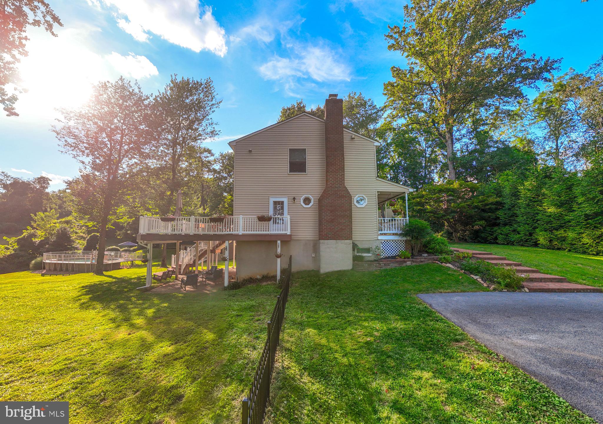3111 Northwind Road Baltimore, MD 21234 - Photo 45 of 81 a view of a house with a yard