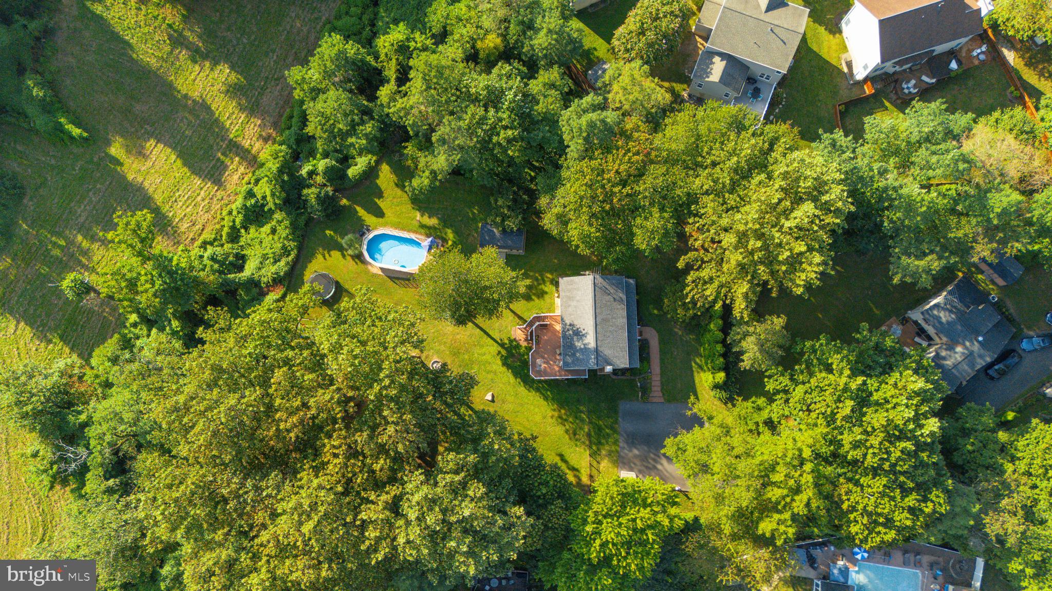3111 Northwind Road Baltimore, MD 21234 - Photo 48 of 81 a view of a house with a yard