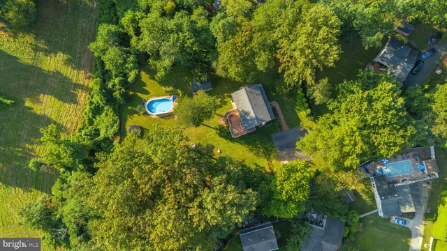 a view of storage and utility room with wooden floor