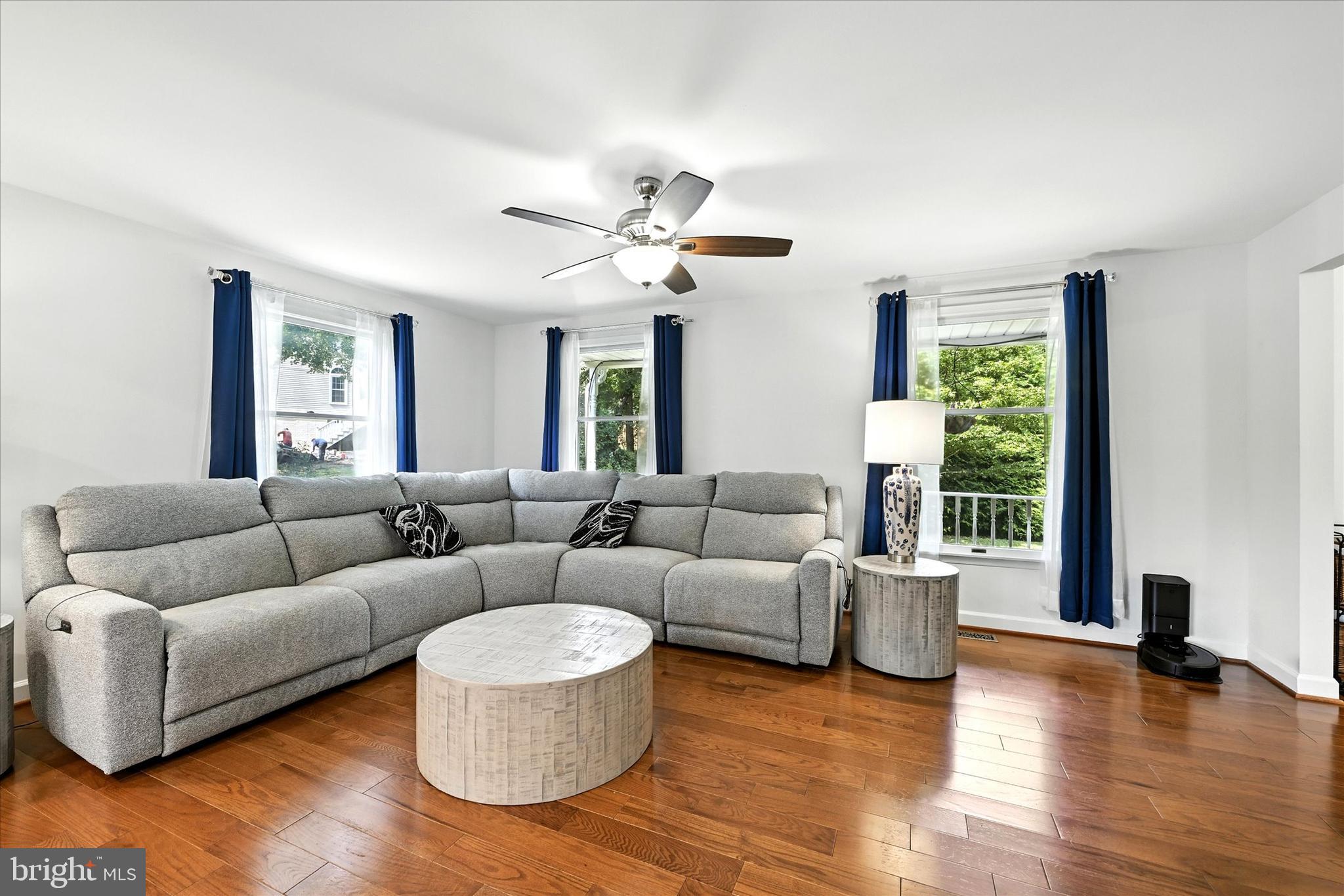 3111 Northwind Road Baltimore, MD 21234 - Photo 7 of 81 a living room with furniture and a large window