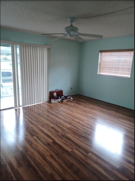 Undisclosed Address Vero Beach, FL 32962 - Photo 16 of 30 wooden floor in an empty room with a window