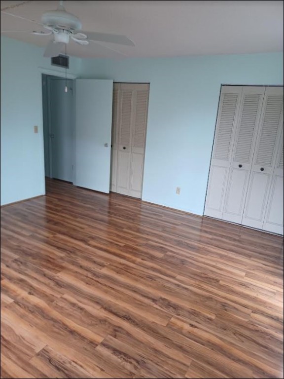 Undisclosed Address Vero Beach, FL 32962 - Photo 17 of 30 a view of an empty room with wooden floor