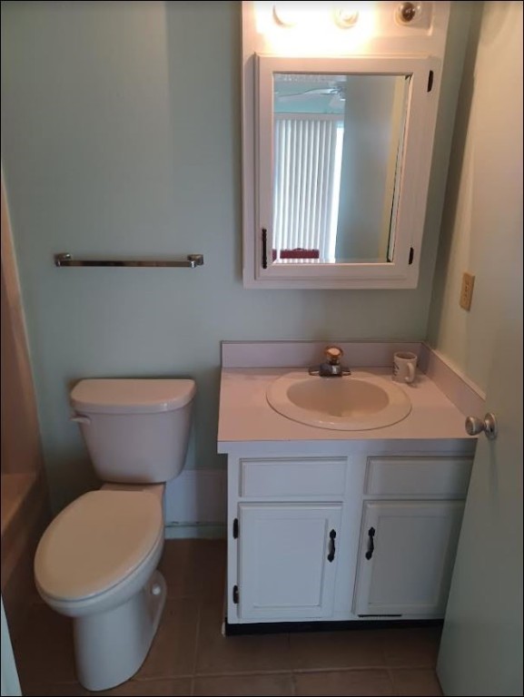 Undisclosed Address Vero Beach, FL 32962 - Photo 20 of 30 a bathroom with a toilet sink and mirror