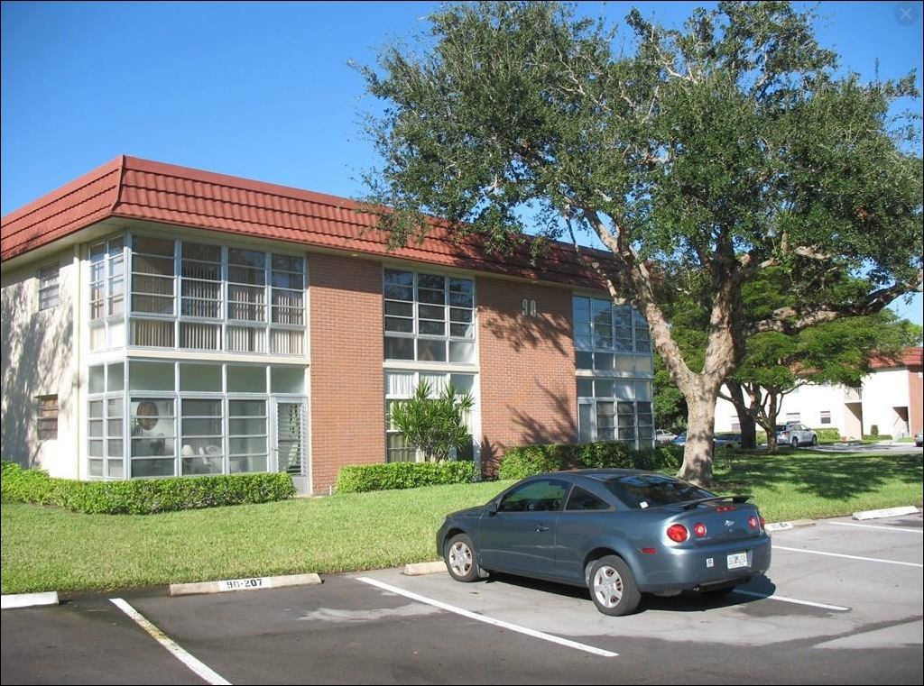 Undisclosed Address Vero Beach, FL 32962 - Photo 3 of 30 a view of a car parked in front of a house