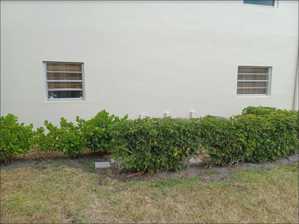 Undisclosed Address Vero Beach, FL 32962 - Photo 5 of 30 a view of a house with a yard