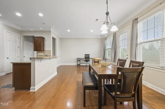 a living room with furniture fireplace and flat screen tv