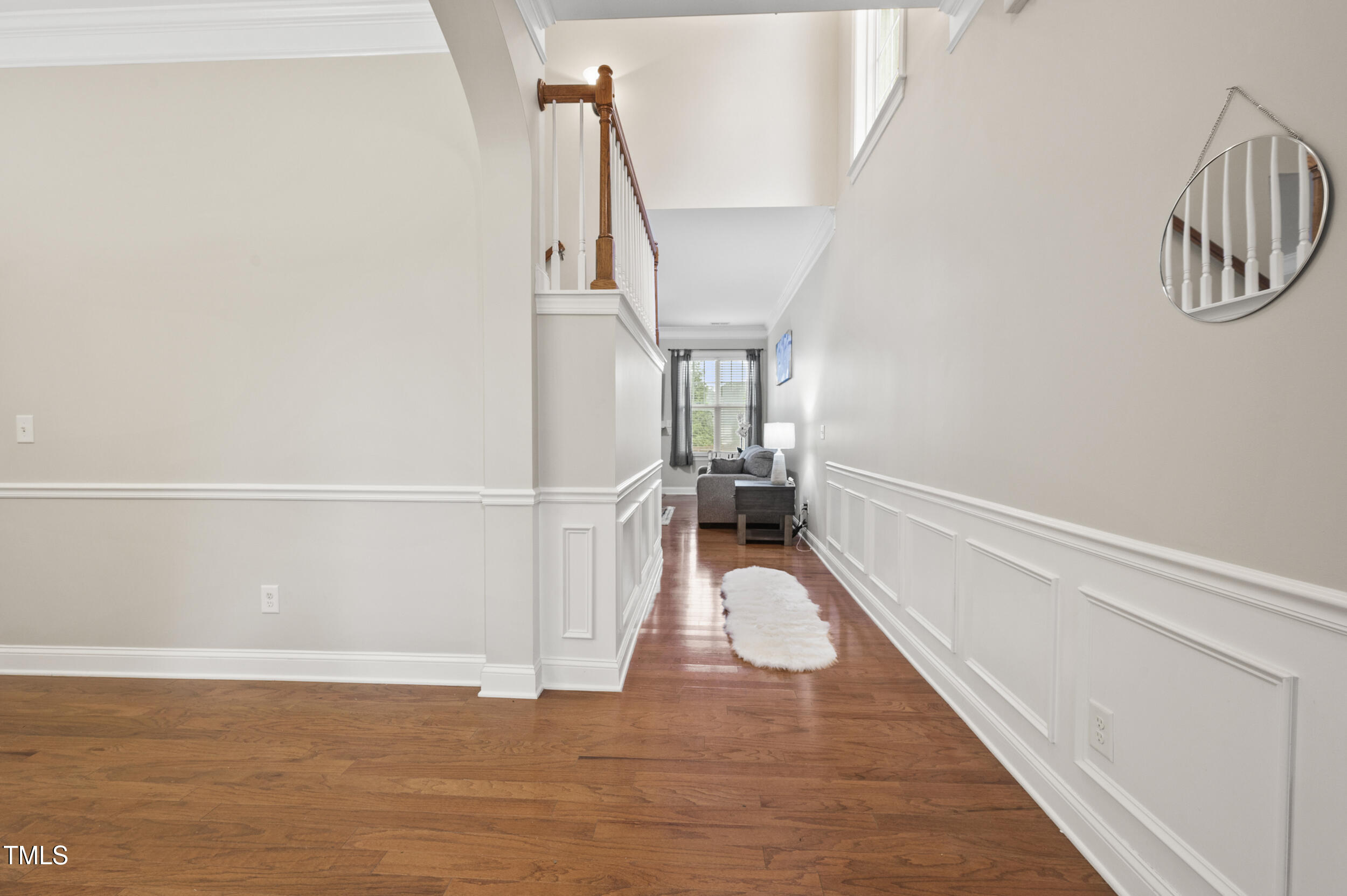 1204 Chapanoke Road Raleigh, NC 27603 - Photo 5 of 45 a view of entryway and hall with wooden floor