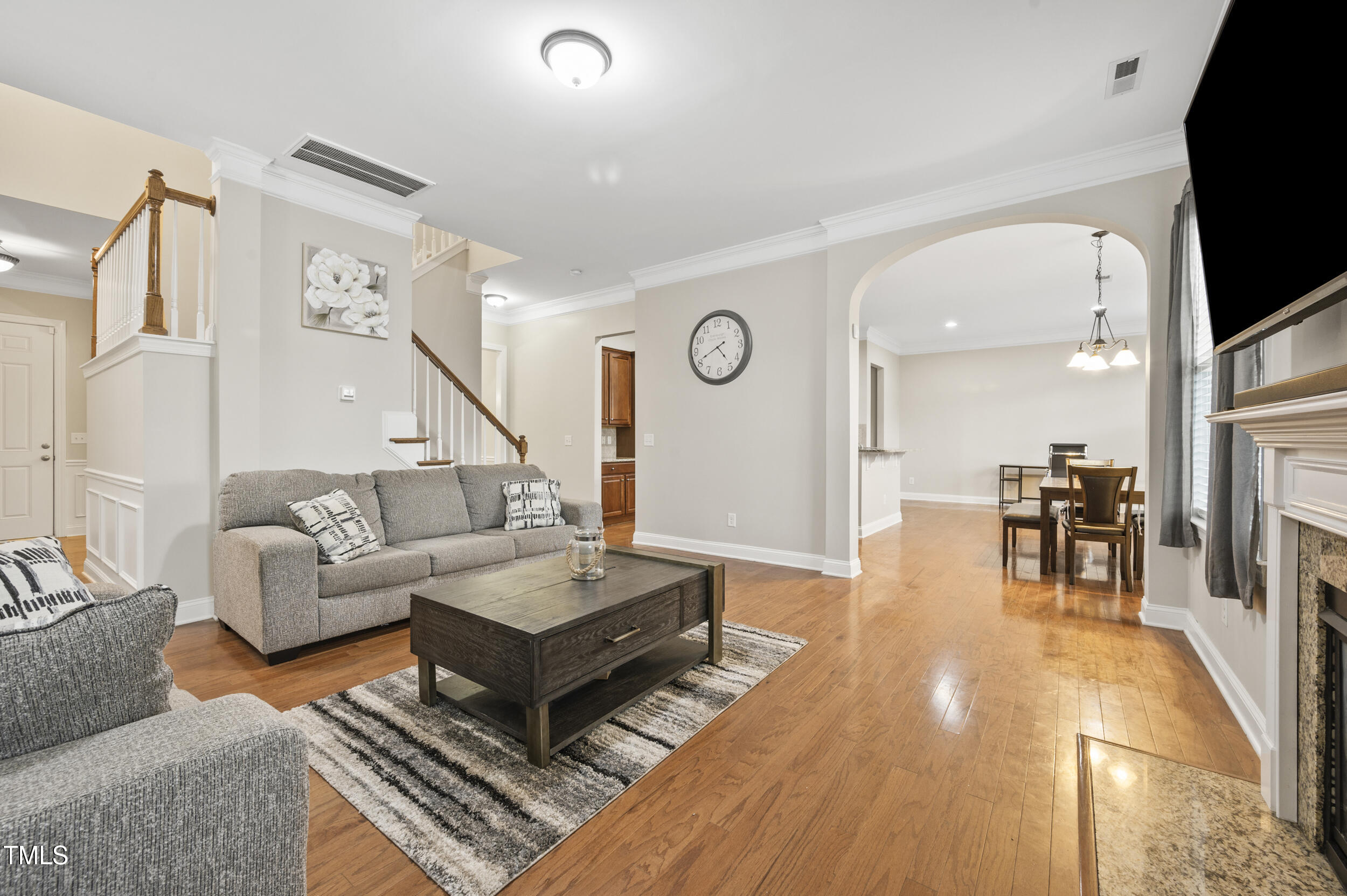 1204 Chapanoke Road Raleigh, NC 27603 - Photo 9 of 45 a living room with furniture and a table