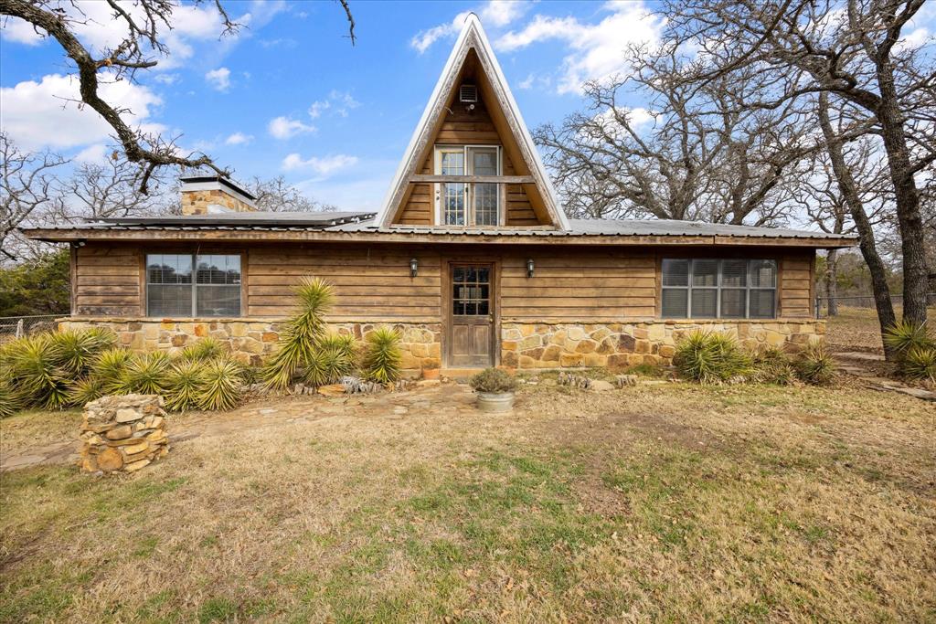 1601 Stafford Road Weatherford, TX 76088 - Photo 30 of 40 a view of a house with a yard