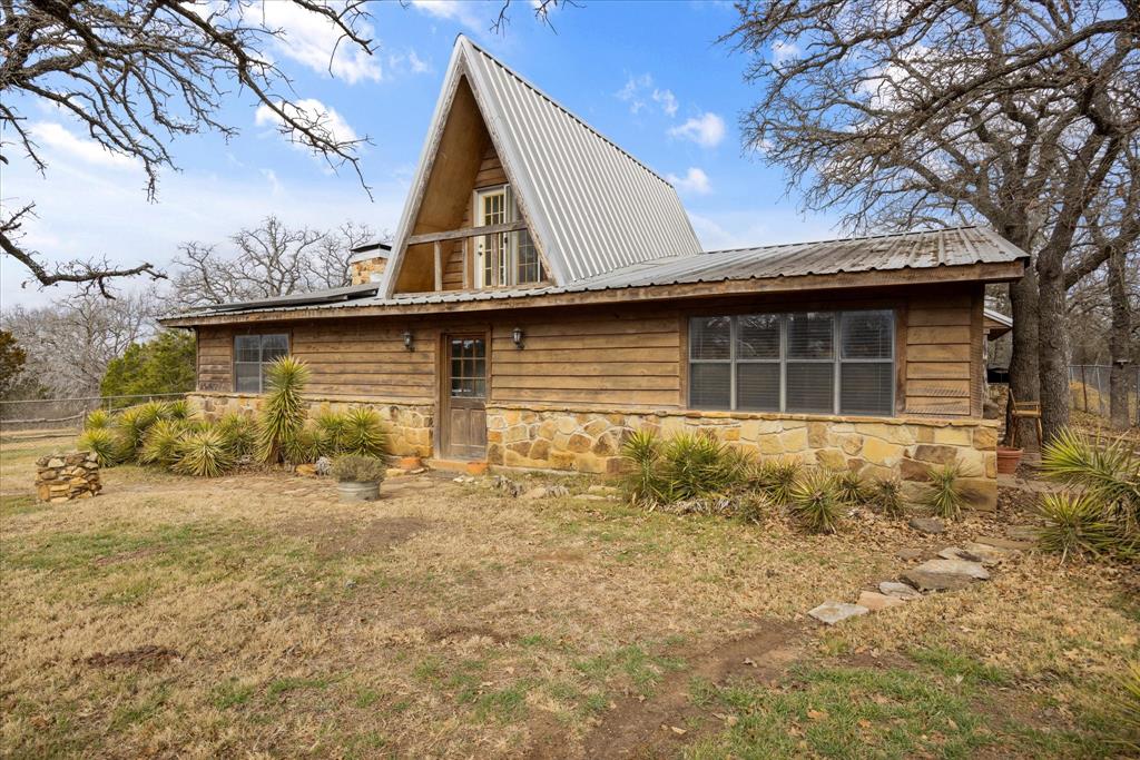 1601 Stafford Road Weatherford, TX 76088 - Photo 31 of 40 a house with trees in front of it