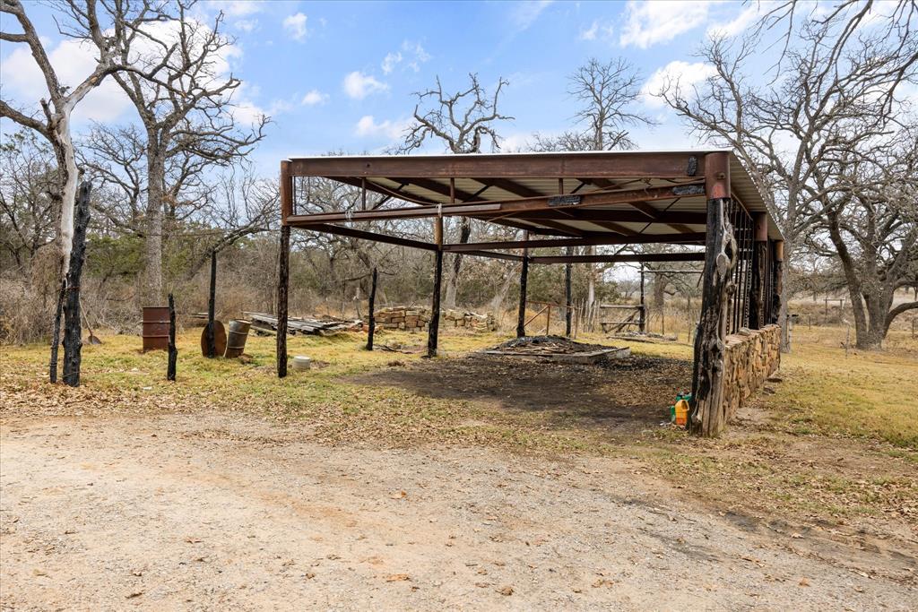1601 Stafford Road Weatherford, TX 76088 - Photo 40 of 40 a backyard of a house with barbeque oven