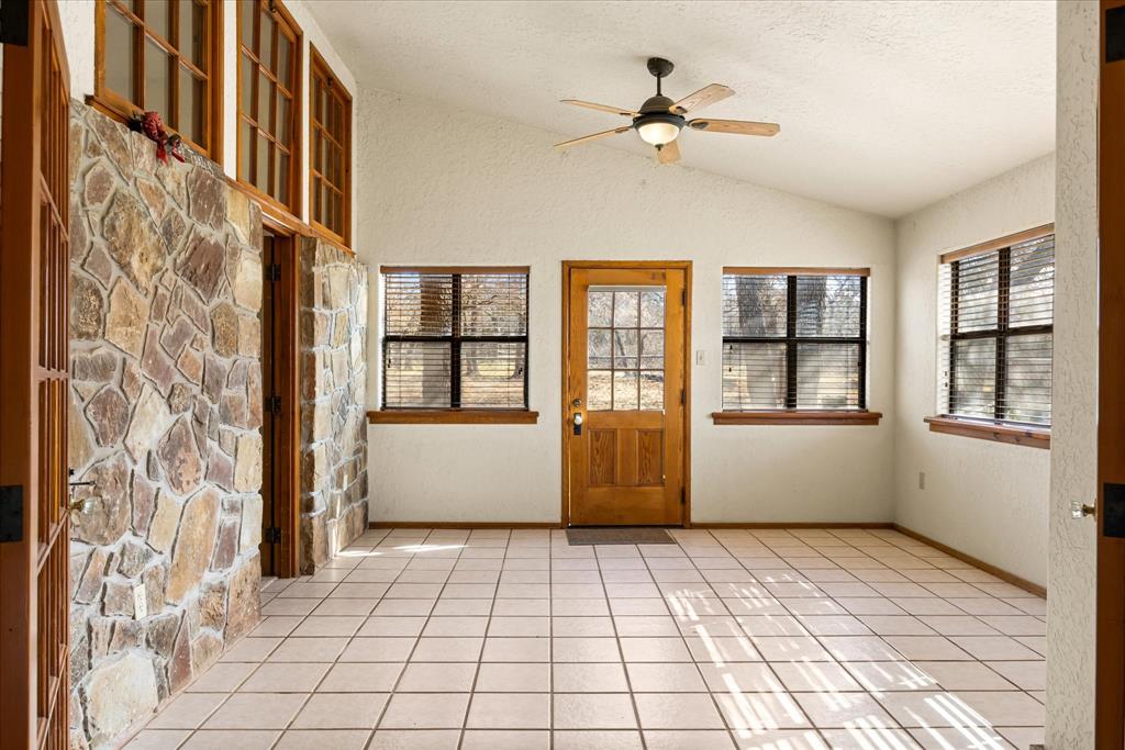 1601 Stafford Road Weatherford, TX 76088 - Photo 5 of 40 a view of an empty room with a window