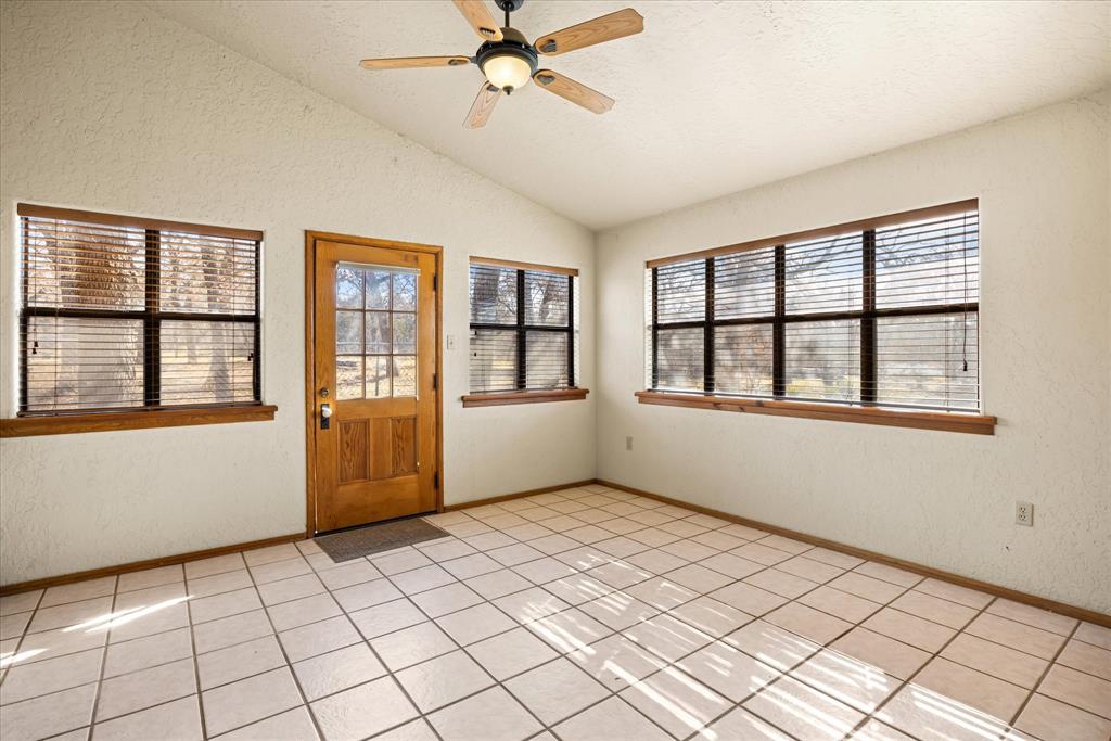 1601 Stafford Road Weatherford, TX 76088 - Photo 6 of 40 a view of an empty room with a window