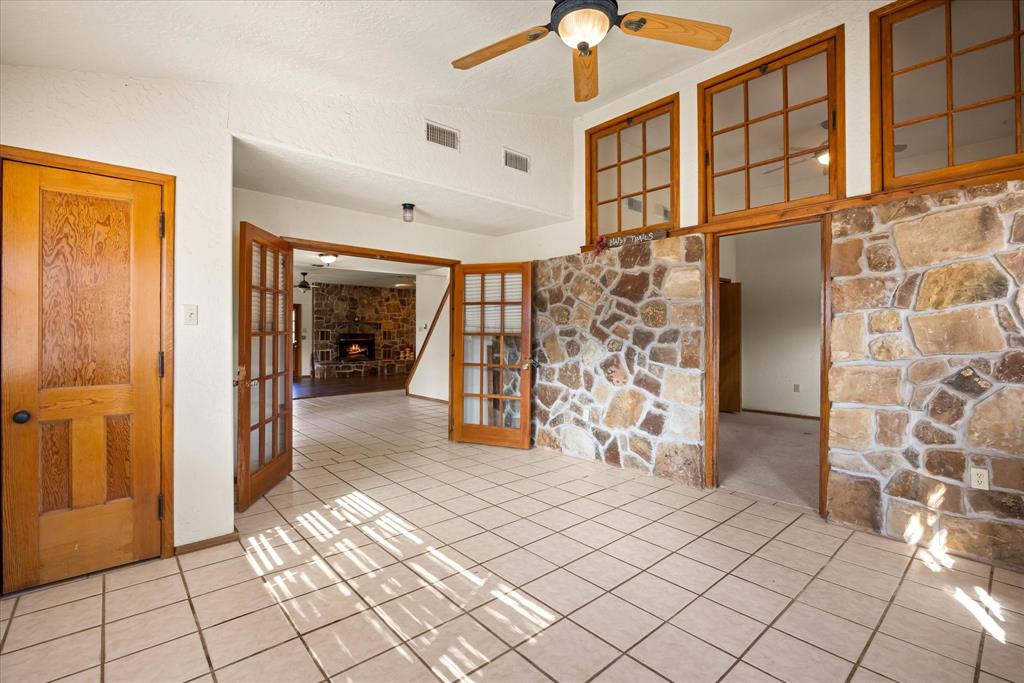 1601 Stafford Road Weatherford, TX 76088 - Photo 7 of 40 a view of empty room with window