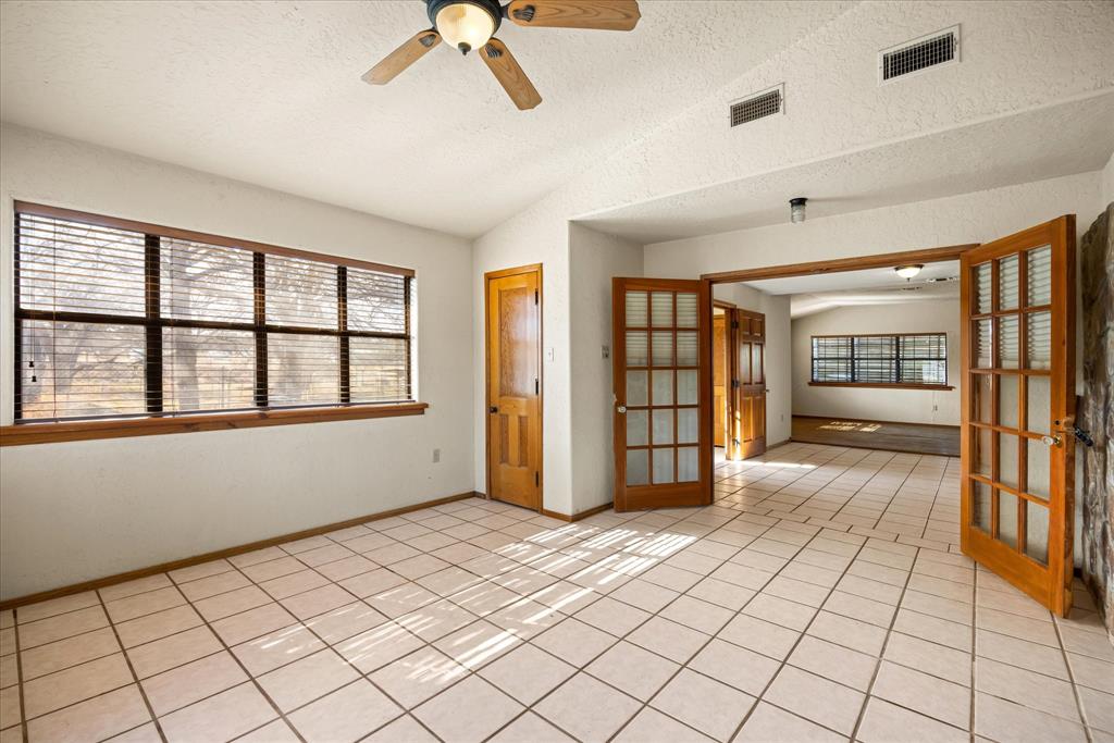 1601 Stafford Road Weatherford, TX 76088 - Photo 10 of 40 a view of an empty room with window