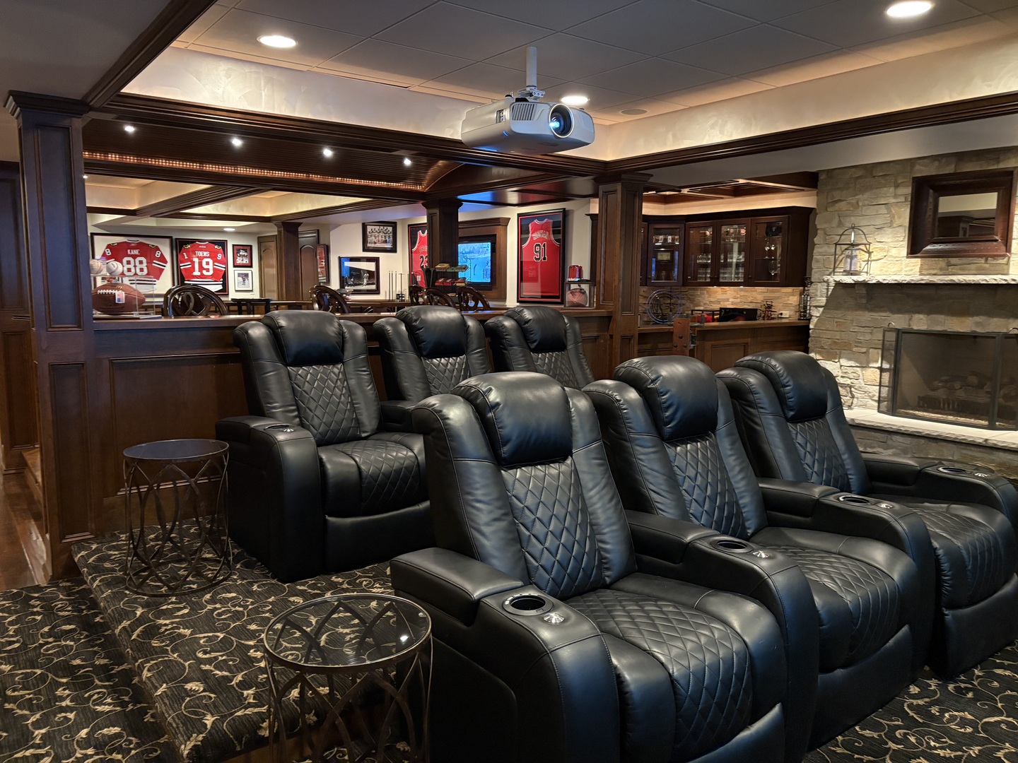 2455 Persimmon Drive St. Charles, IL 60174 - Photo 36 of 64 a media room with lots of chairs and a flat screen tv