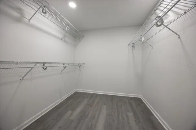 a view of a room with racks on the wall