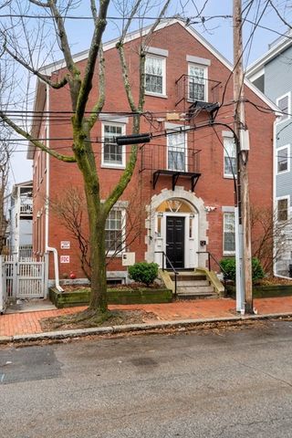 front view of a house with a street