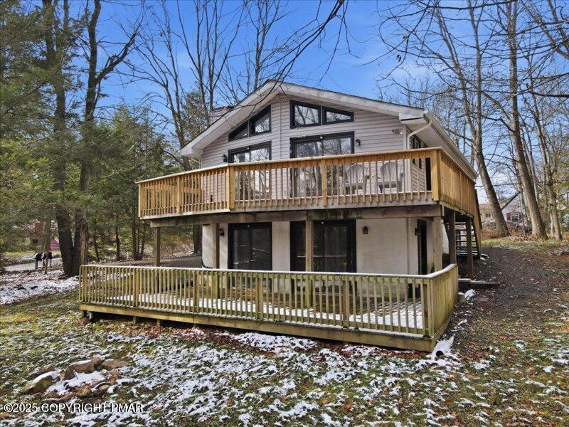 2167 Freedom Way Pocono Summit, PA 18346 - Photo 2 of 45 a view of a house with a yard