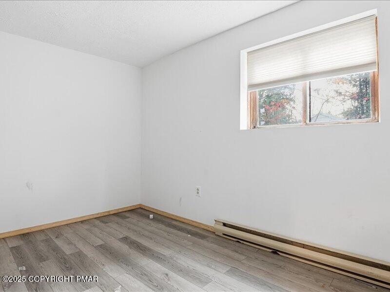 2167 Freedom Way Pocono Summit, PA 18346 - Photo 30 of 45 an empty room with a window