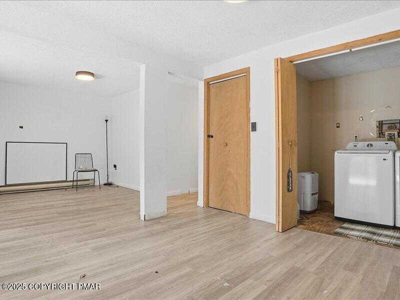 2167 Freedom Way Pocono Summit, PA 18346 - Photo 38 of 45 a view of empty room with wooden floor