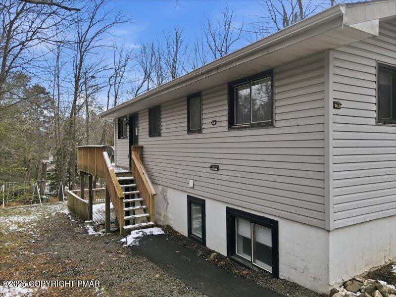 2167 Freedom Way Pocono Summit, PA 18346 - Photo 9 of 45 a view of a house with a yard and garage