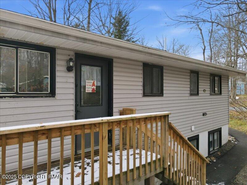 2167 Freedom Way Pocono Summit, PA 18346 - Photo 10 of 45 a view of a house with a window