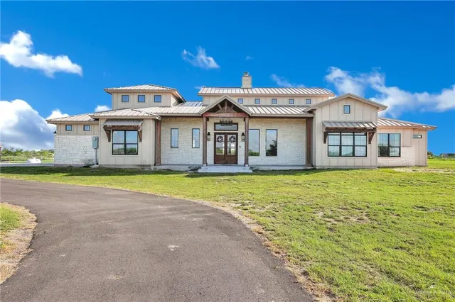 a view of a house with a swimming pool