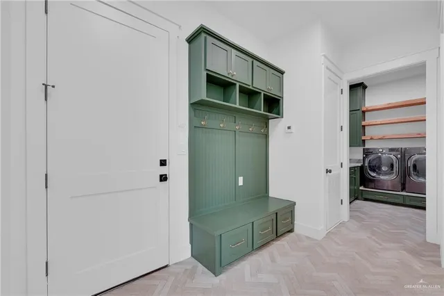 a bedroom with a bed and cabinets