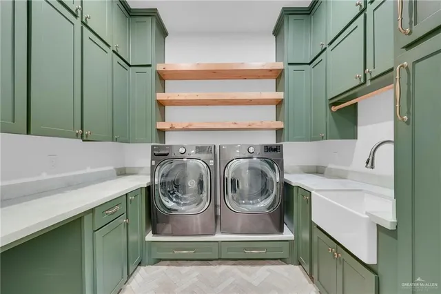 a bathroom with a granite countertop sink mirror vanity and toilet