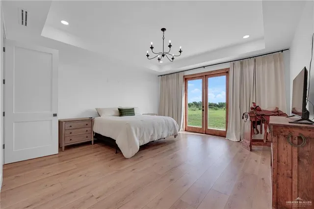 a living room with a walk in closet and closet