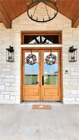a view of a door and garage