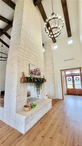 a view of a living room and a wooden floor