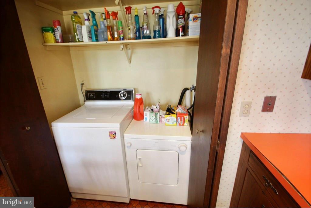 9119 Levelle Drive Chevy Chase, MD 20815 - Photo 11 of 30 a utility room with dryer and washer