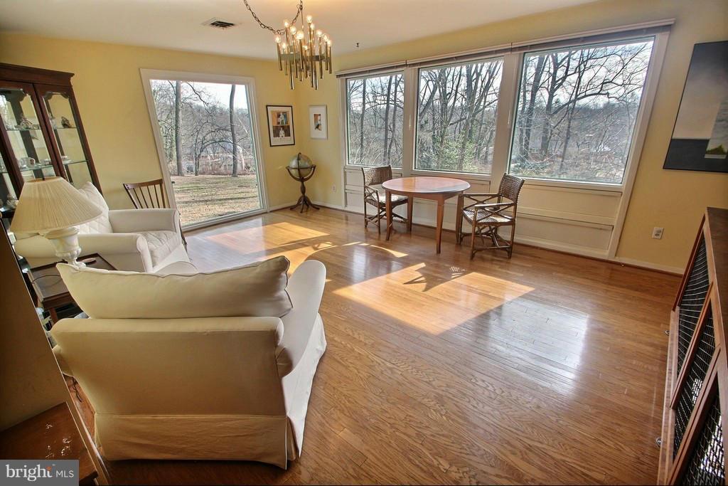 9119 Levelle Drive Chevy Chase, MD 20815 - Photo 13 of 30 a living room with furniture and a large window