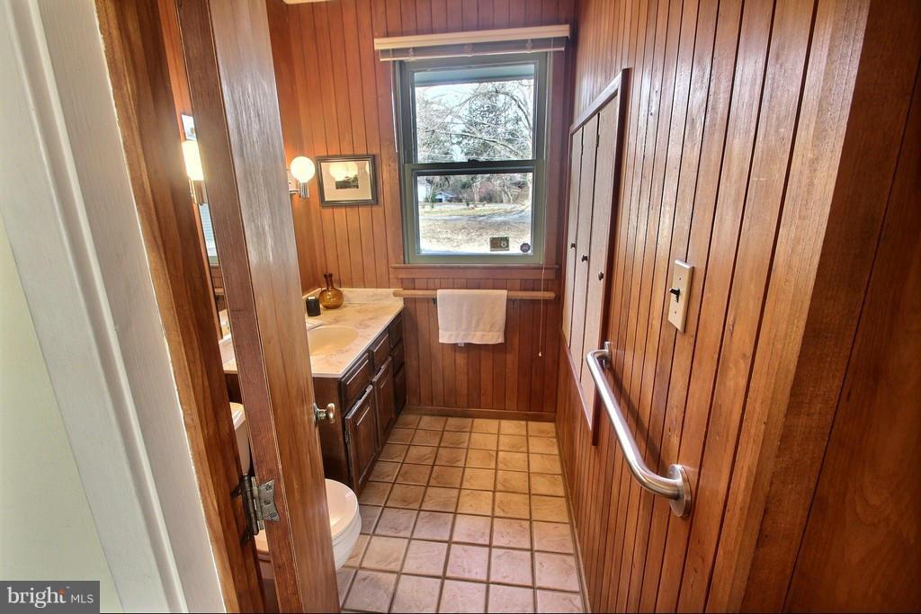 9119 Levelle Drive Chevy Chase, MD 20815 - Photo 15 of 30 a bathroom with shower curtain
