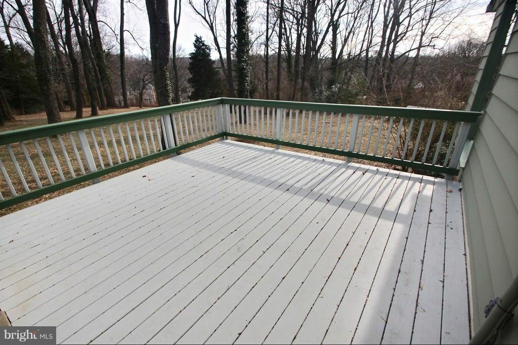 9119 Levelle Drive Chevy Chase, MD 20815 - Photo 5 of 30 a view of balcony with wooden floor and fence