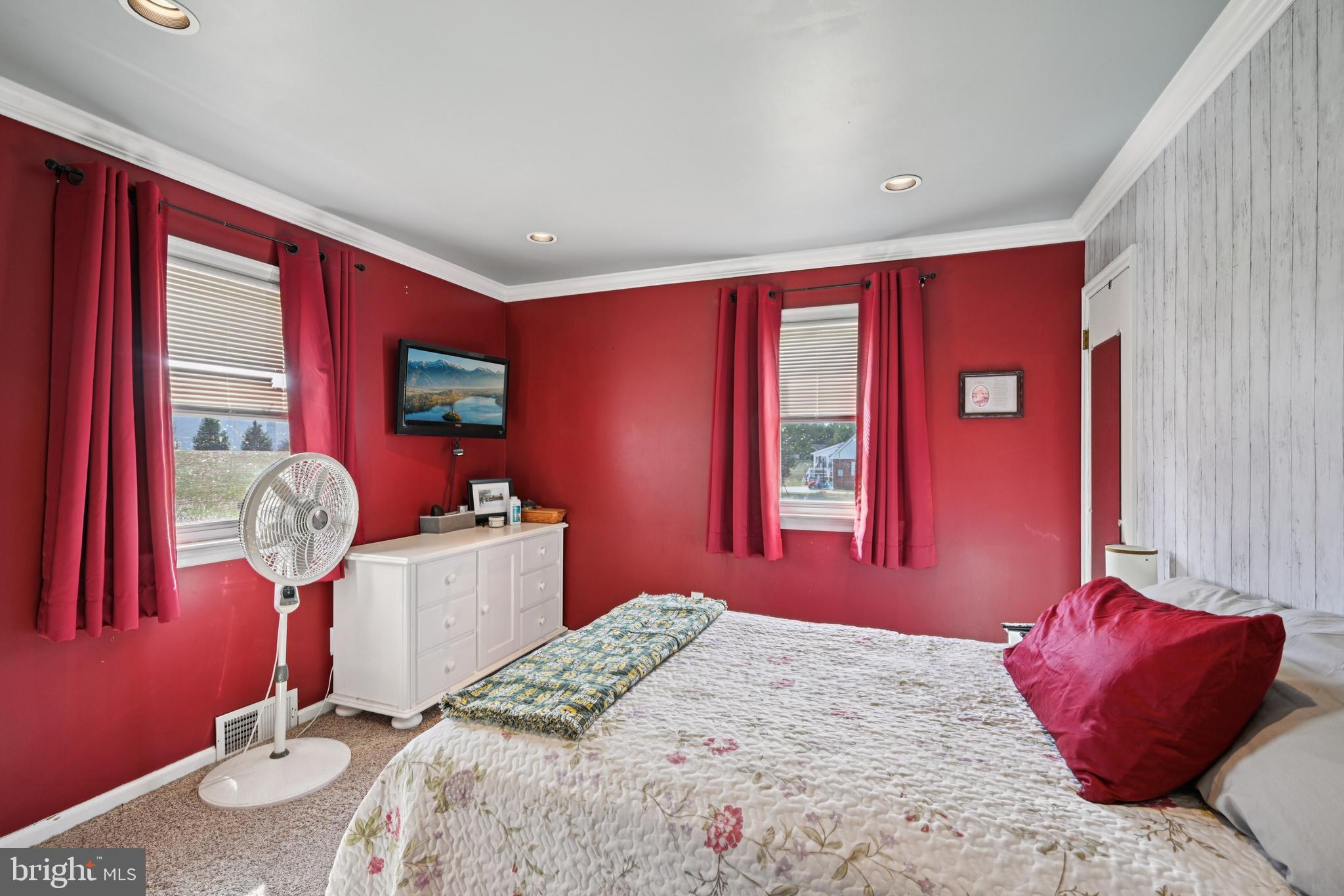 328 Pedricktown Road Swedesboro, NJ 08085 - Photo 19 of 41 a bedroom with a bed and wooden floor