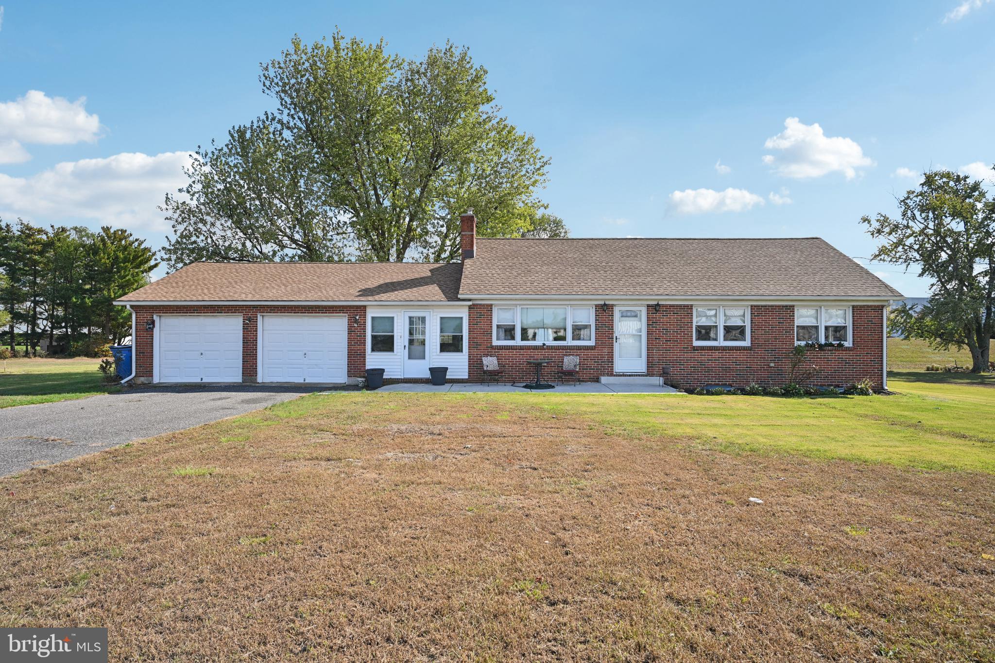 328 Pedricktown Road Swedesboro, NJ 08085 - Photo 2 of 41 a front view of a house with a yard and trees
