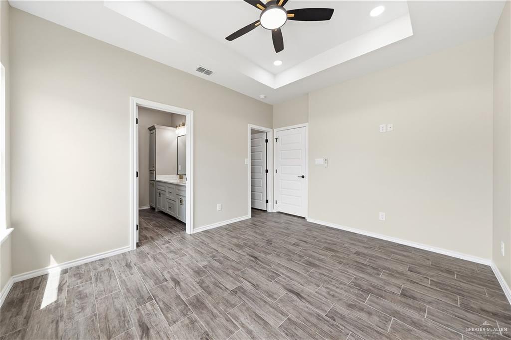 18032 Spruce Street Combes, TX 78552 - Photo 10 of 14 wooden floor in an empty room