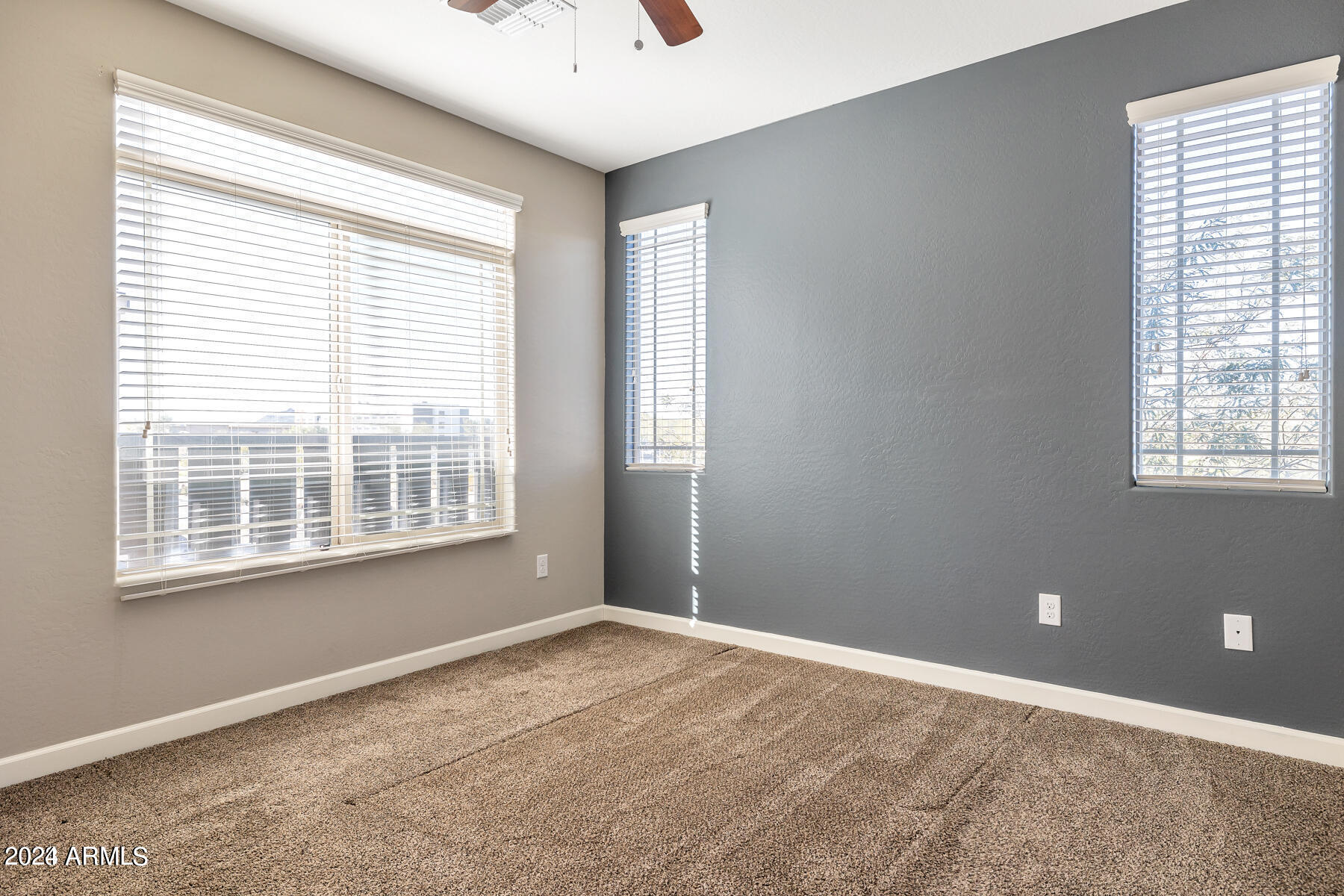 2150 West Alameda Road, Unit 1169 Phoenix, AZ 85085 - Photo 14 of 26 a view of an empty room with a window
