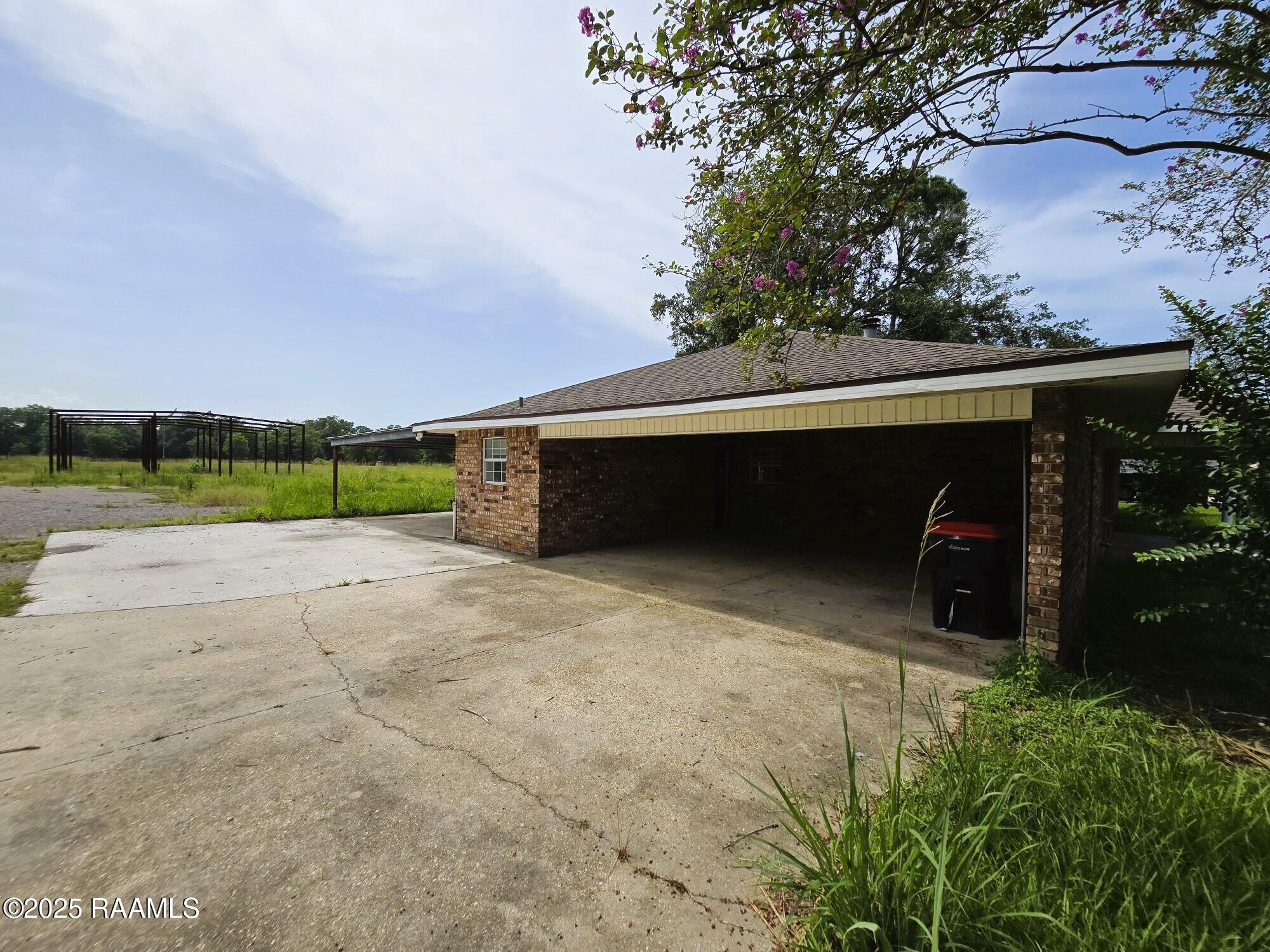 311 North Fieldspan Road Scott, LA 70583 - Photo 20 of 28 20 LEFT SIDE