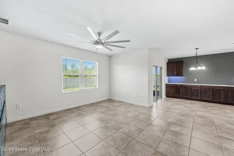 a stone fireplace with a hallway