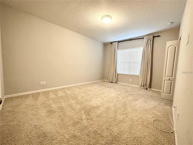 an empty room with a natural light