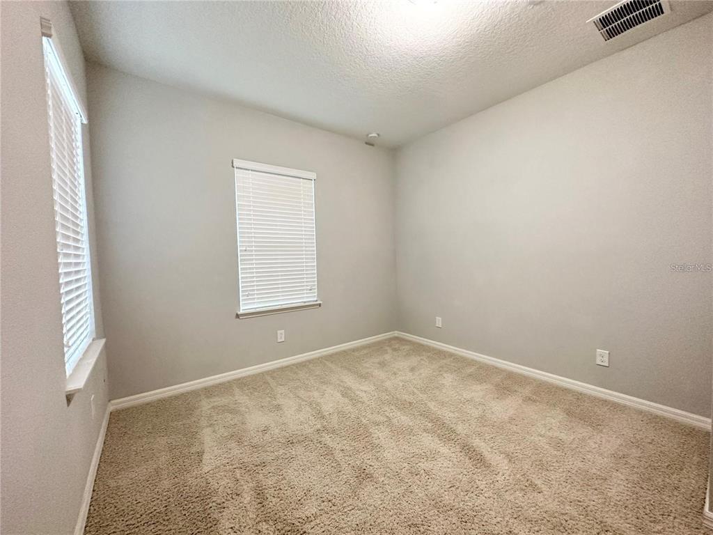 122 Zamora Place Oviedo, FL 32765 - Photo 21 of 23 an empty room with a window
