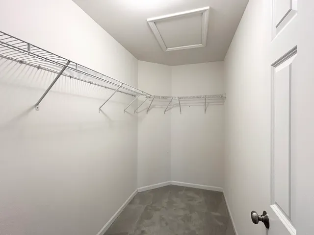 a view of a room with racks on the wall