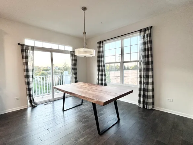 a view of a room with furniture window and wooden floor