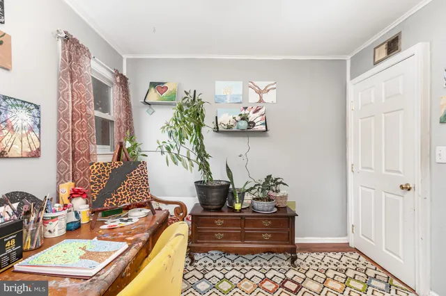 a room with furniture and window