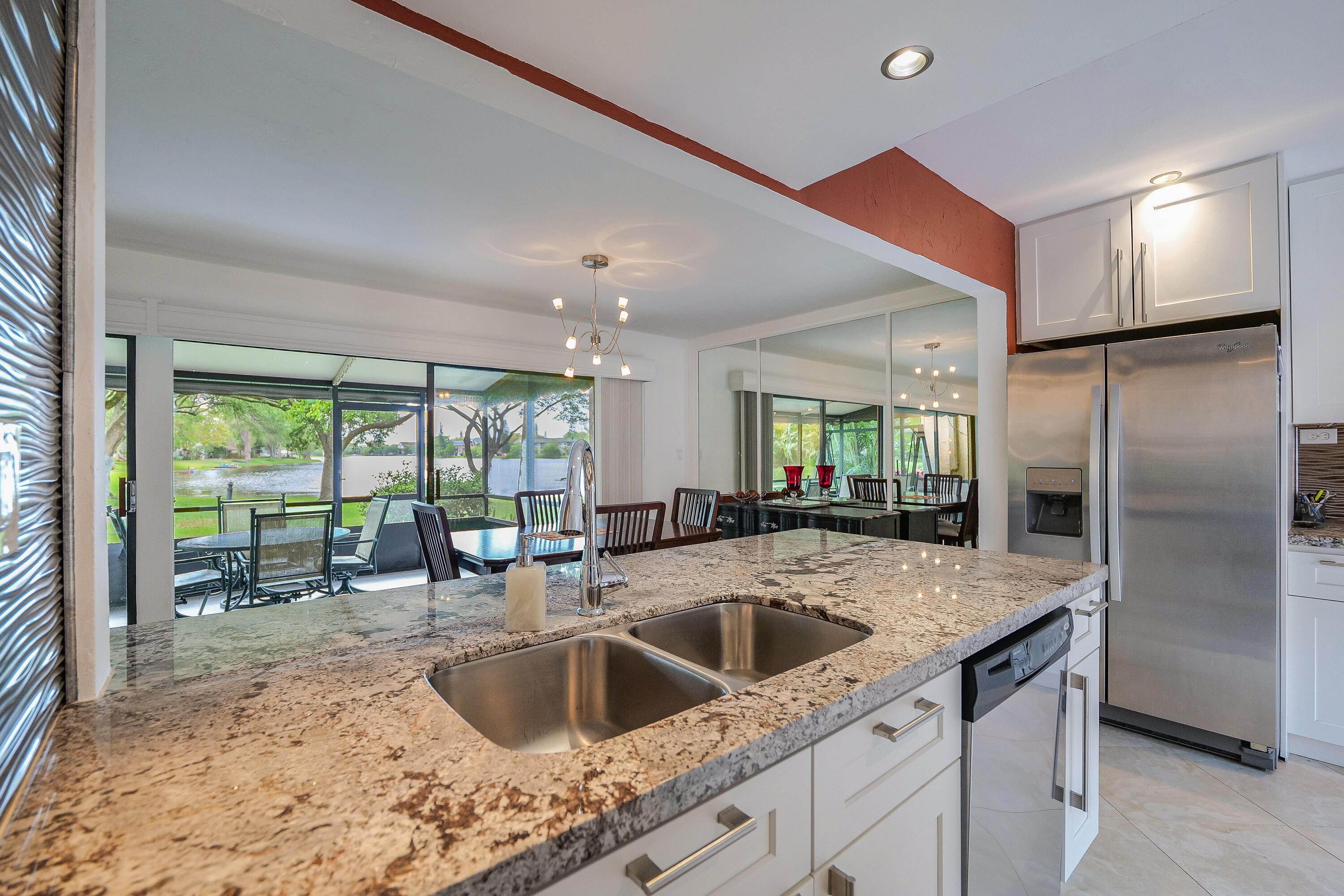 3425 Lime Hill Road, Unit 169 Lauderhill, FL 33319 - Photo 11 of 51 a kitchen with a sink and a refrigerator