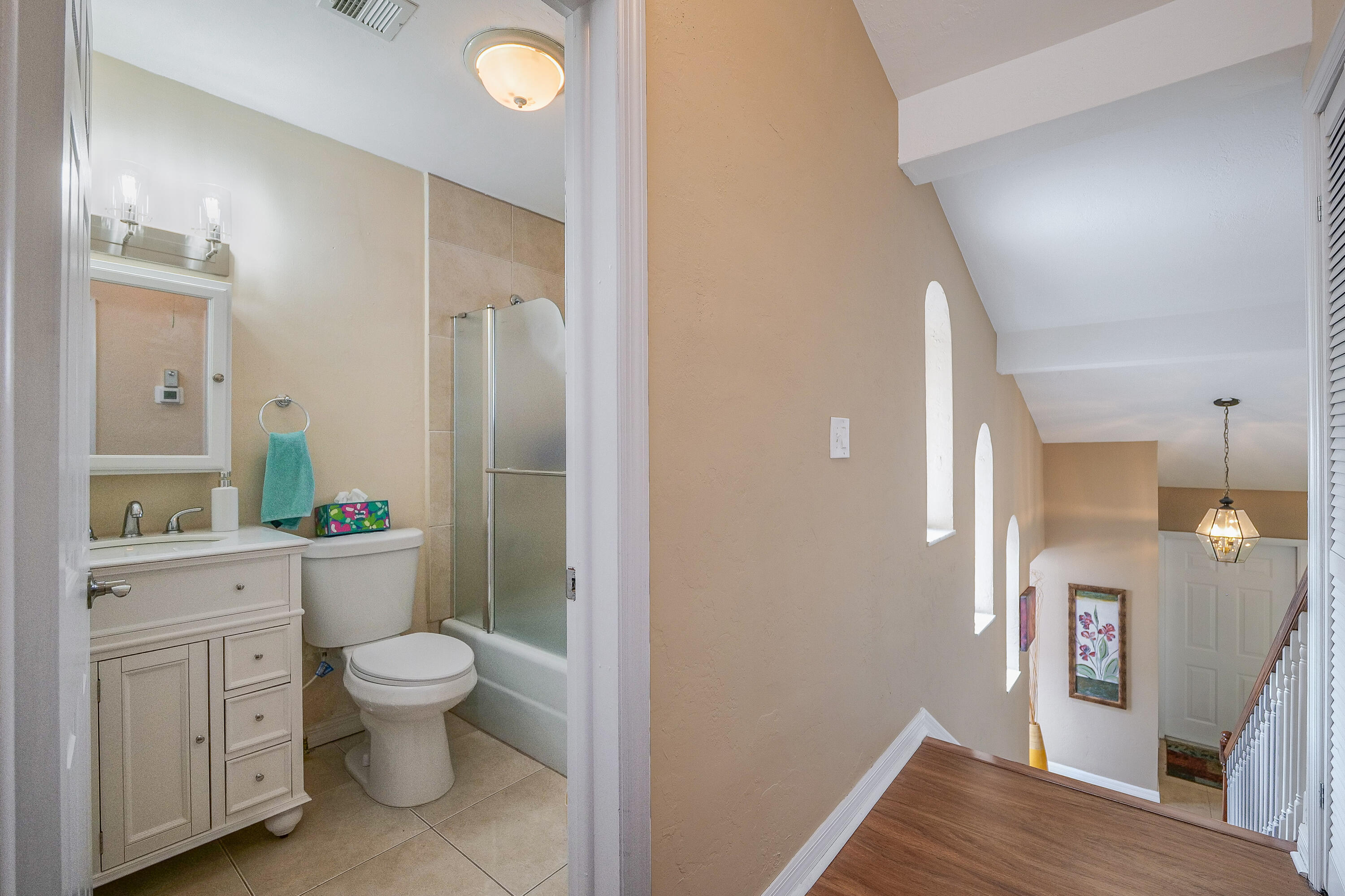 3425 Lime Hill Road, Unit 169 Lauderhill, FL 33319 - Photo 19 of 51 a bathroom with a sink a toilet and shower